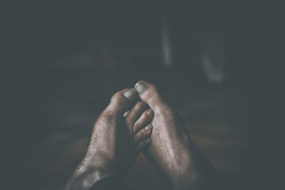 Close-up of man over black background