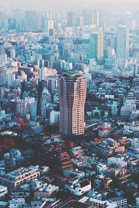 High angle view of buildings in city against sky