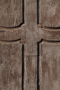 Full frame shot of weathered wooden door