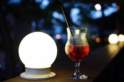 Close-up of wineglass on table