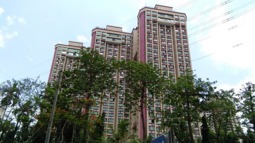 Low angle view of skyscrapers against sky