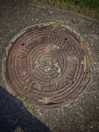 High angle view of manhole on street