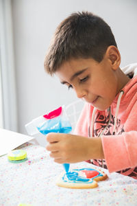 Portrait of child homemade cookies decoration