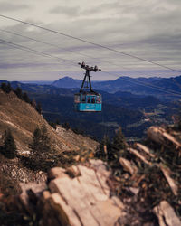 Overhead cable car over mountains