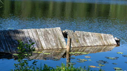 High angle view of wooden post in lake