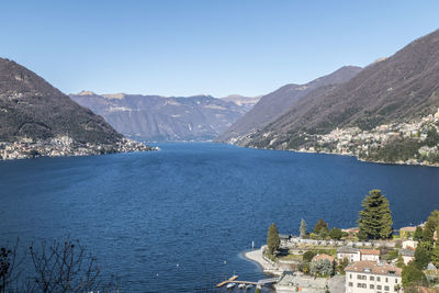 Scenic view of mountains against clear blue sky