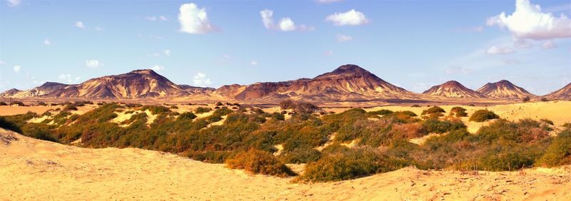 Panoramic view of desert against sky