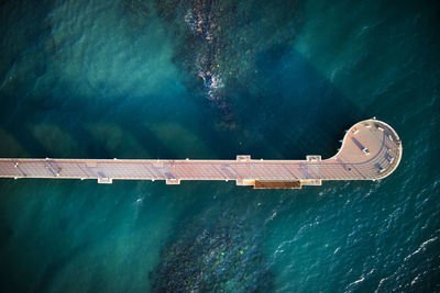 Aerial view of pier in sea