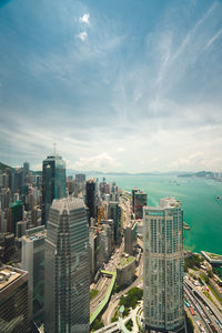 High angle view of buildings in city against sky