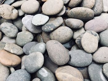 Full frame shot of gray and brown pebbles