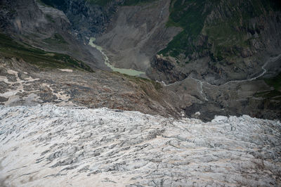 Scenic view of stream flowing through rocks