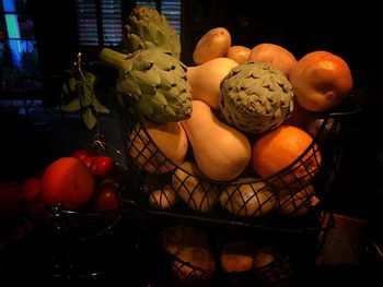 High angle view of fruits in basket on table