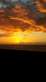 Silhouette of beach at sunset