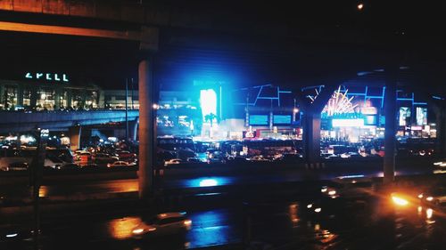 Reflection of illuminated buildings in water at night