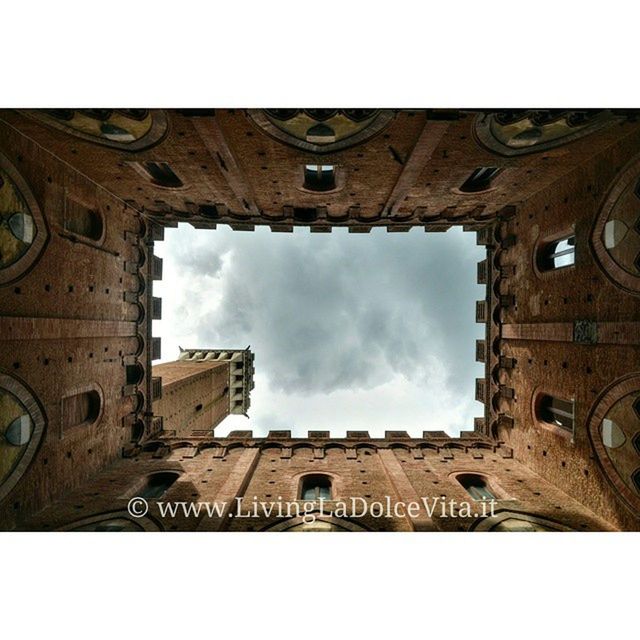 architecture, built structure, building exterior, church, religion, transfer print, sky, low angle view, history, cathedral, place of worship, auto post production filter, spirituality, arch, old, cloud - sky, the past, clock tower