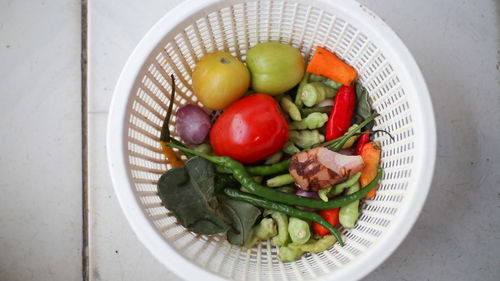 High angle view of fruit salad in bowl on table