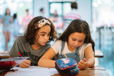 Portrait of girls together in classroom