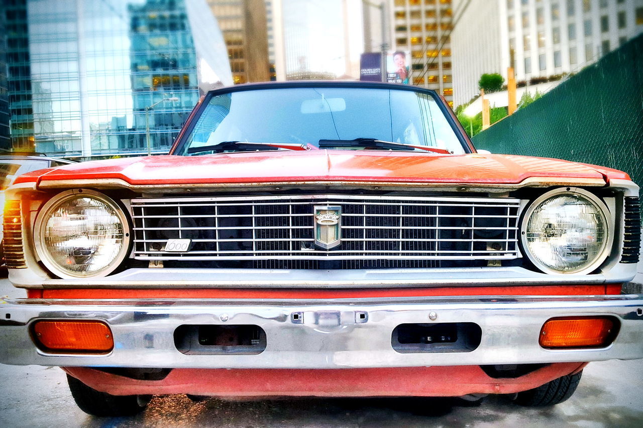 VINTAGE CAR PARKED ON STREET