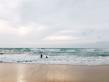 Scenic view of beach against sky