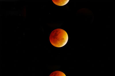 Scenic view of moon against clear sky at night