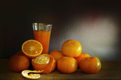 Close-up of orange fruits on table