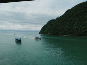 Scenic view of bay against sky