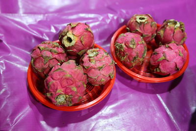 High angle view of pink flowers on table