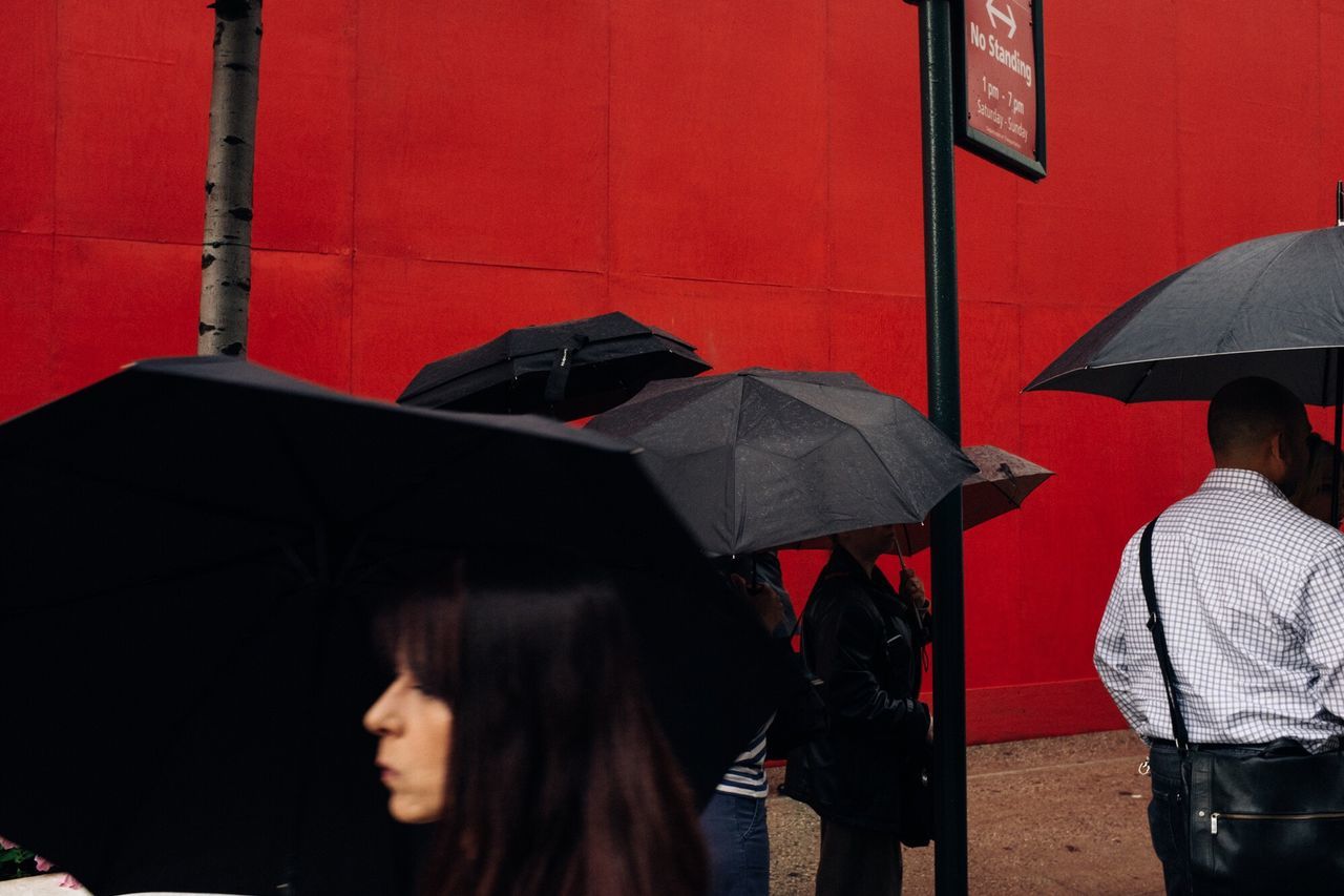 umbrella, rain, protection, weather, real people, wet, waiting, under, below, holding, red, outdoors, lifestyles, women, city, day