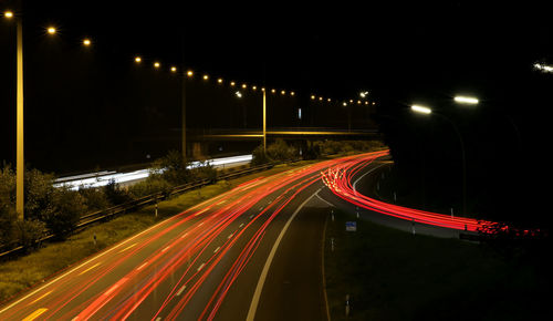 Light trails on road at night