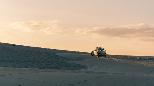 Scenic view of desert against sky