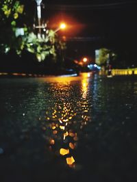 Surface level of wet street during rainy season at night