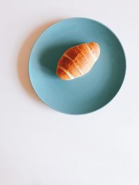 High angle view of orange on white table