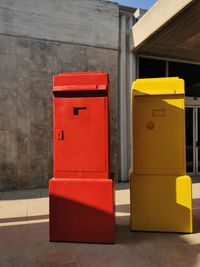 Close-up of mailboxes on wall