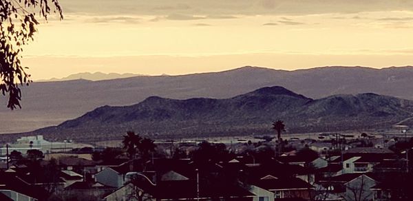 High angle view of townscape against sky during sunset