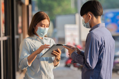 Young woman using mobile phone