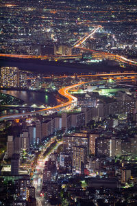 High angle view of illuminated cityscape at night