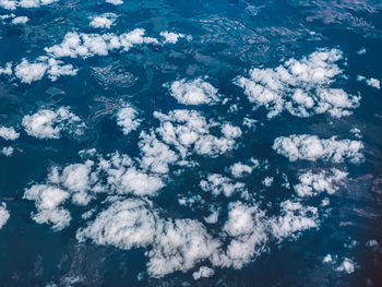 High angle view of blue sea against sky