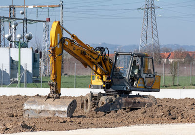 Heavy construction machinery at work.