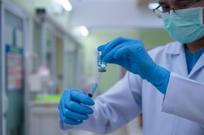 Midsection of person working