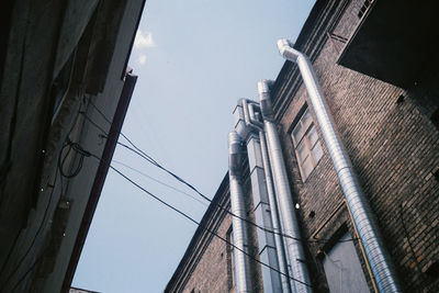 Low angle view of cables against sky