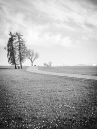 Scenic view of field against sky during winter