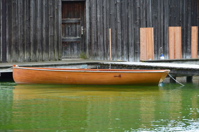 Boat moored in water