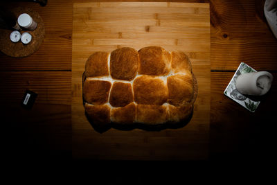 High angle view of bread and coffee on table