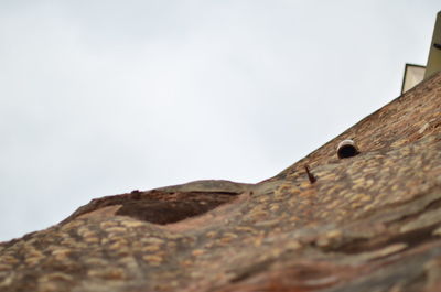 Low angle view of built structure against sky
