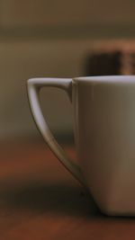 Close-up of coffee cup on table