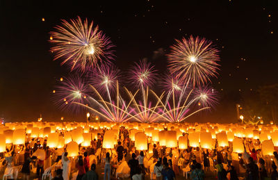 Firework display at night