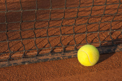 Close-up of yellow ball on field