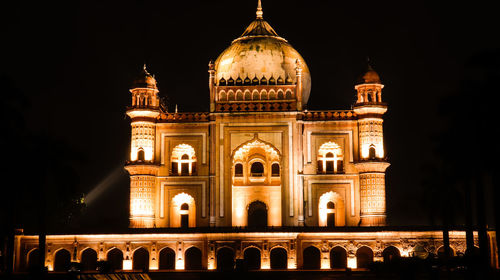 Low angle view of illuminated building at night