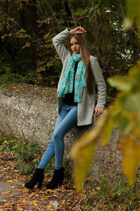 Portrait of young woman in forest