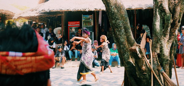 People standing on street in city